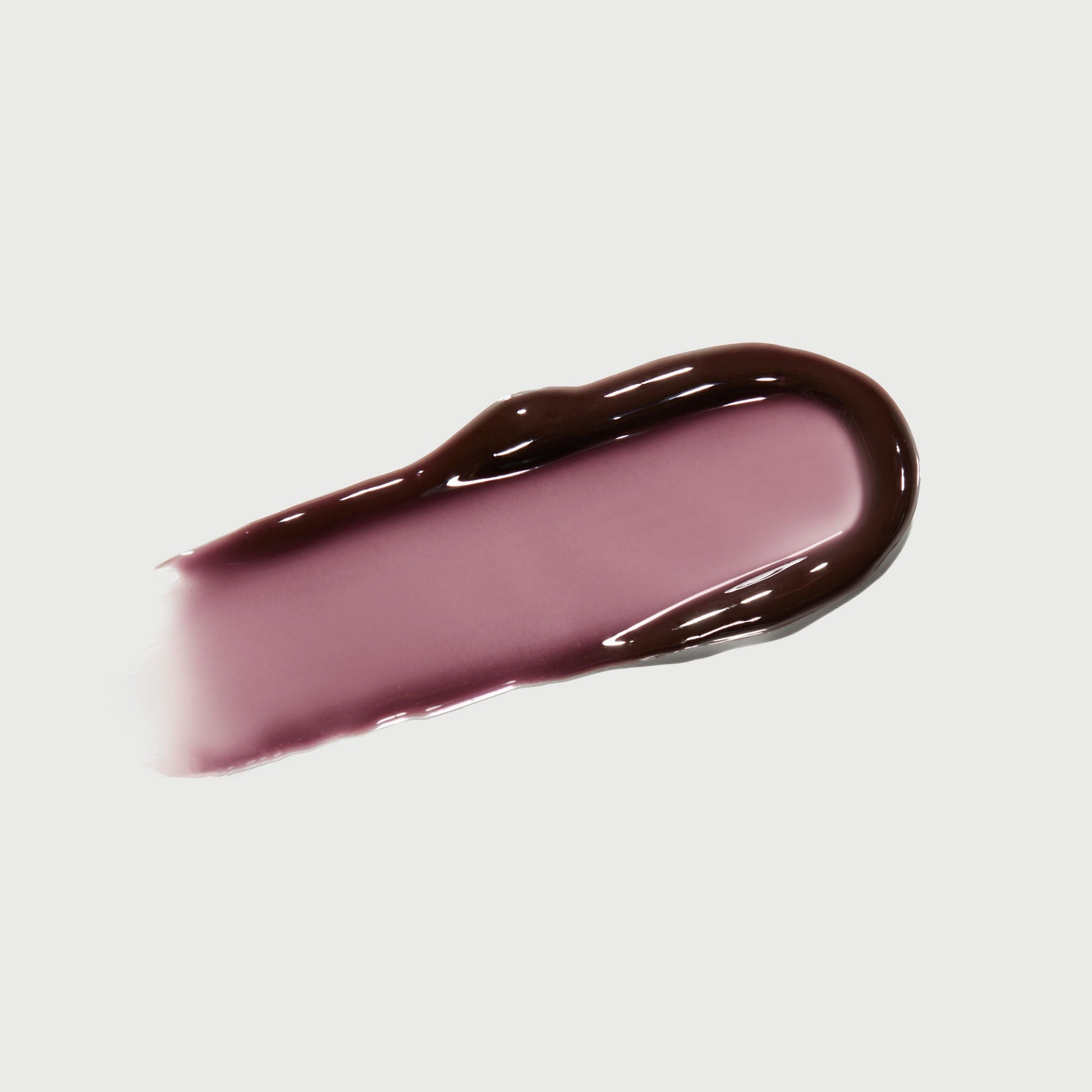 phyto-glow-lip-balm-midnight-c7 NATR-10118-Swatch-Phyto-Glow-Midnight-bonebkgd.jpg
