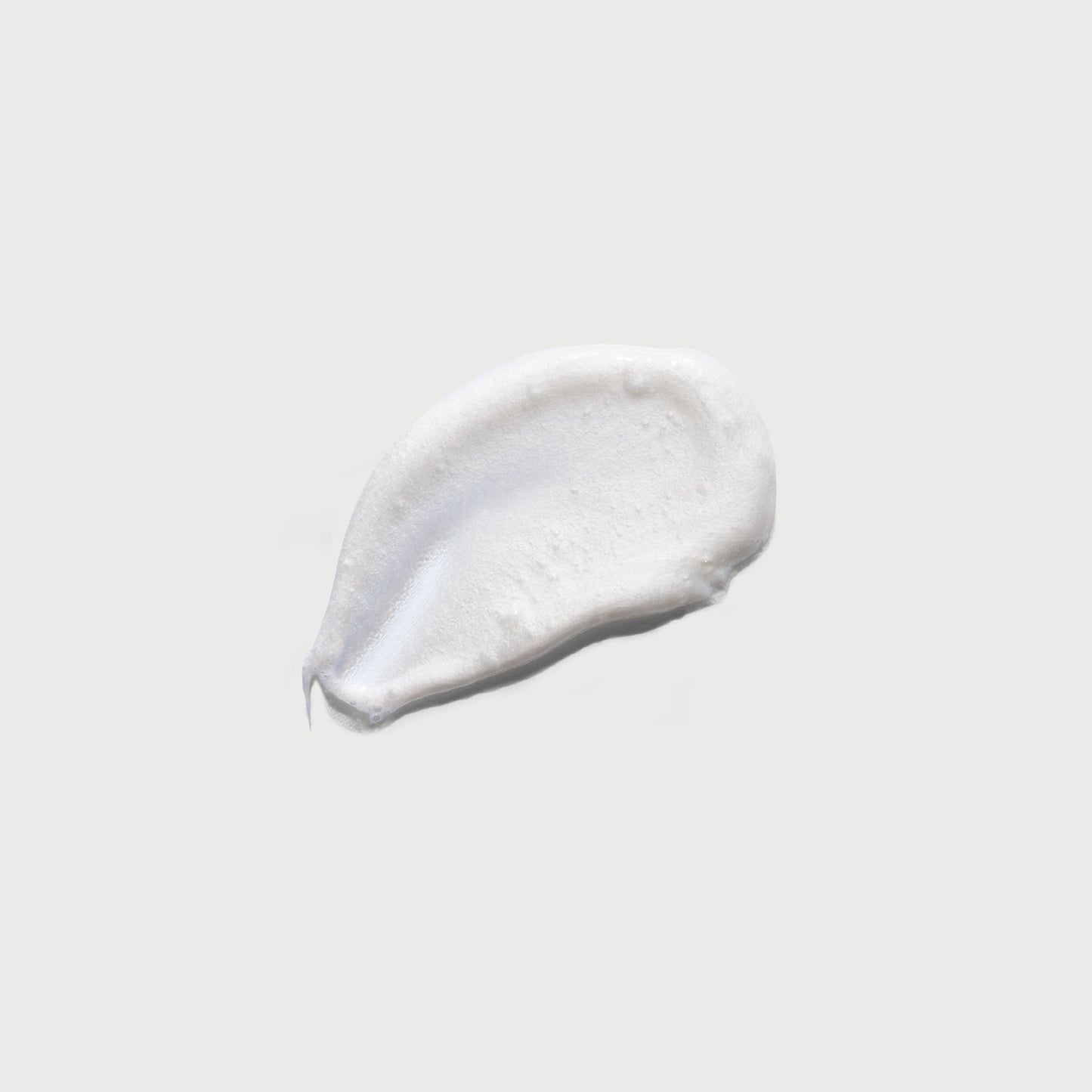 the-smoother-glycolic-acid-exfoliating-body-wash-c6 NATR-40002-Swatch-The-Smoother-Glycolic-Acid-Exfoliating-Body-Wash-bonebkgd.jpg