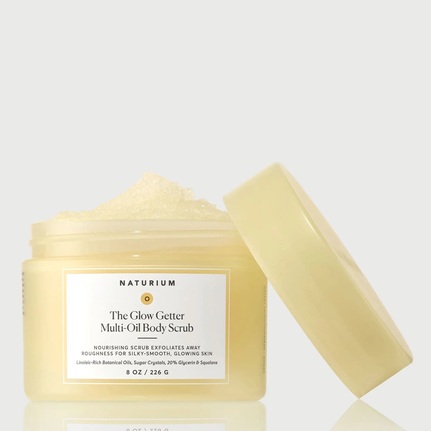 the-glow-getter-multi-oil-body-scrub-r0 NATR-40028-GlowGetter-Multi-Oil-Body-Scrub-Front-CapOff-bonebkgd.webp