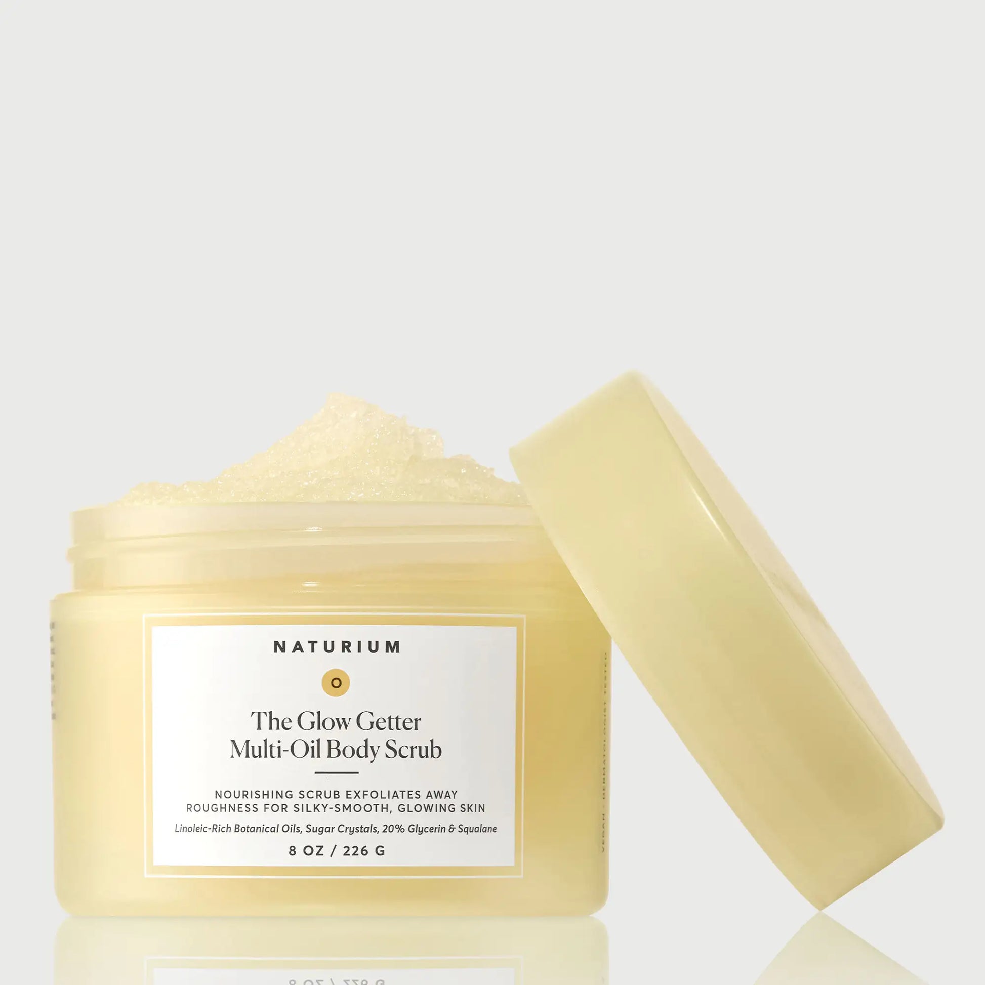 the-glow-getter-multi-oil-body-scrub-r0 NATR-40028-GlowGetter-Multi-Oil-Body-Scrub-Front-CapOff-bonebkgd.webp