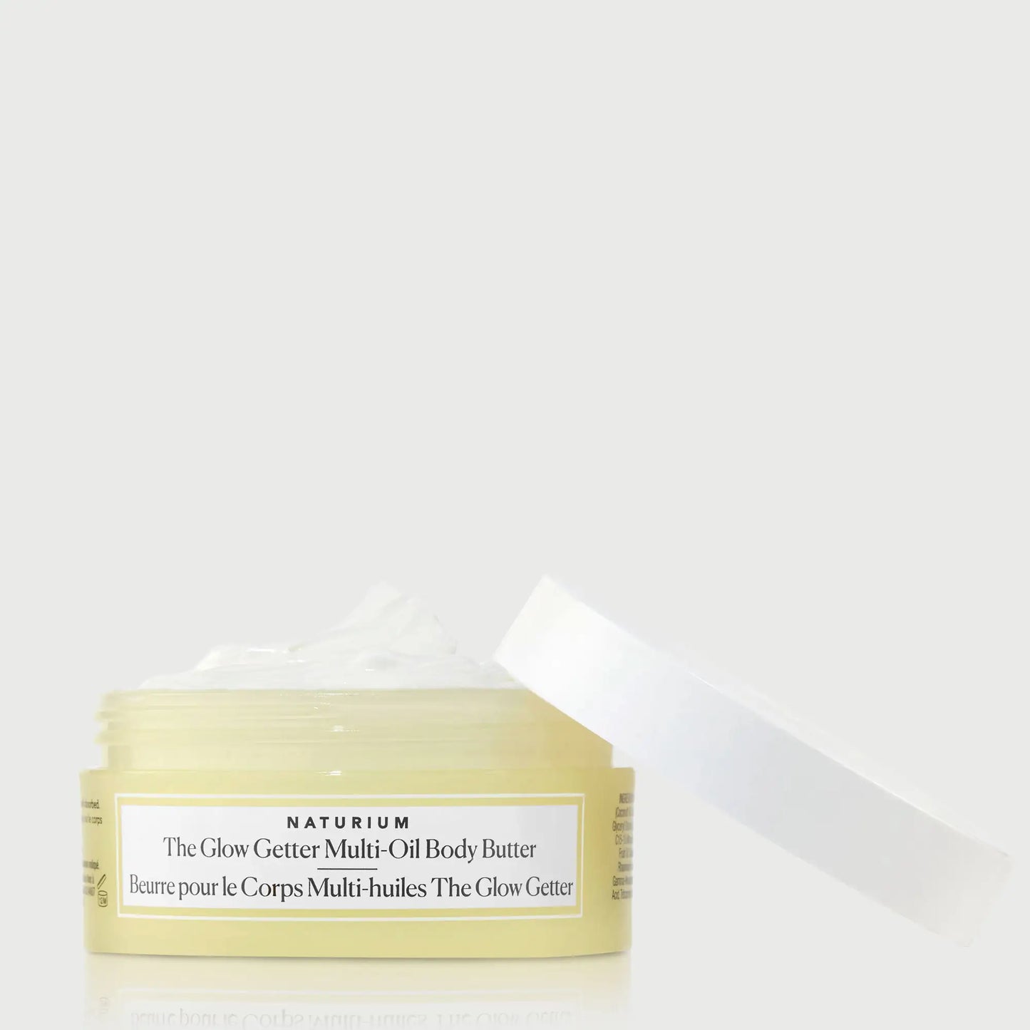 the-glow-getter-multi-oil-body-butter-travel-size-c5 NATR-40115_Glow-Getter-Body-Butter-Mini_front_capoff_bonebkgd.webp