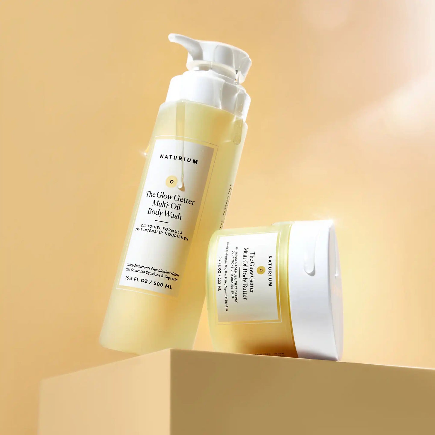 the-glow-all-out-body-bundle-x0 gg-bodybutter_1464-crop_revcolor_FL.webp